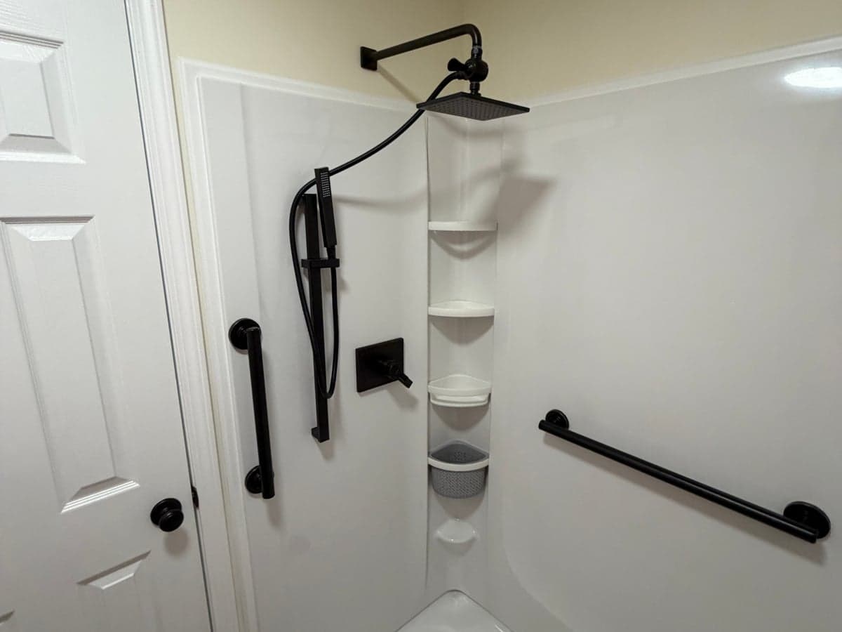 low-threshold acrylic walk-in shower with grab bars in Clarksville, TN by JM Home and Property Services (1)