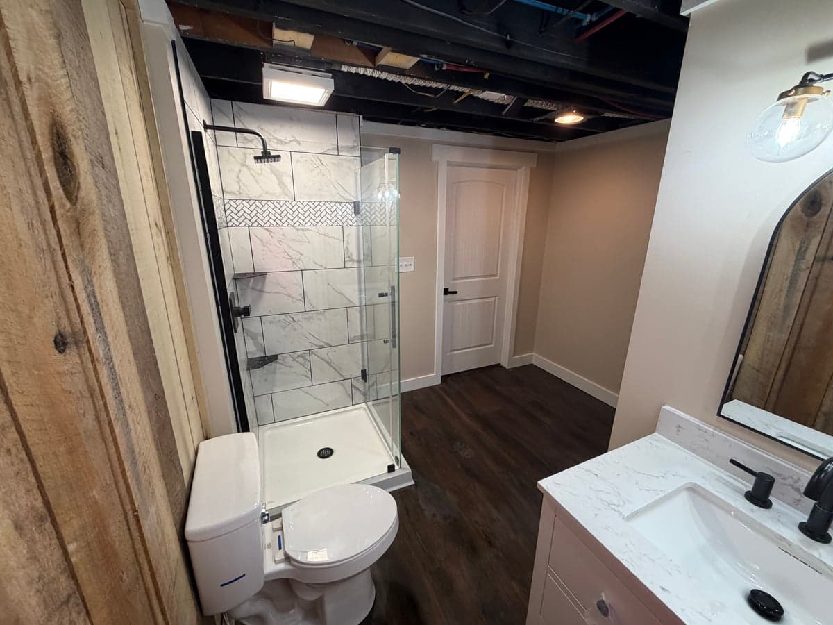 corner glass shower with tile surround in Clarksville, TN by JM Home and Property Services (2)
